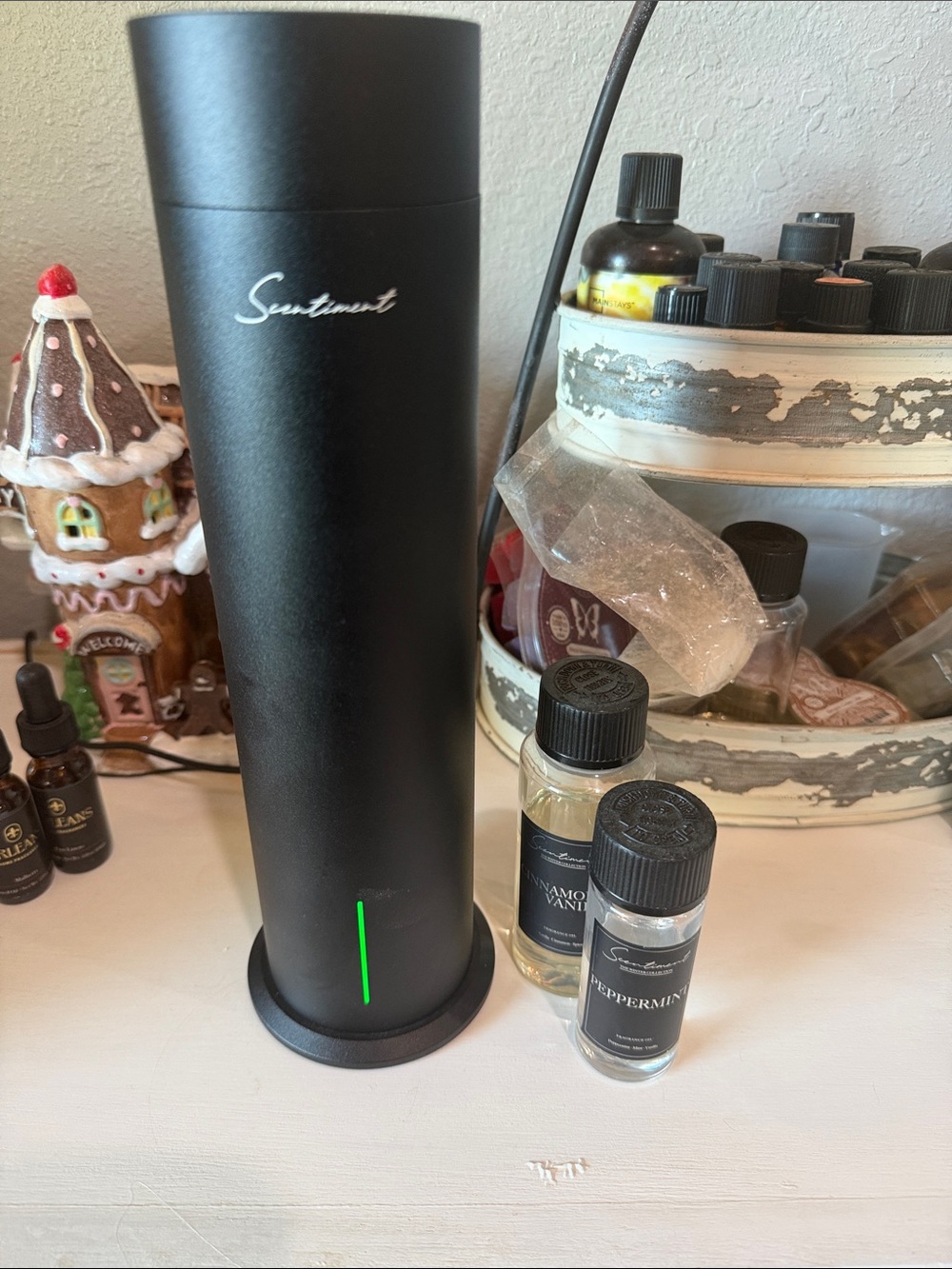 Scentiment diffuser comes with remote and two bottles of scent
